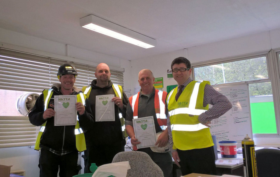 From left to right: Jon Aplin (Teamwork), Andy Mitchell (Quality), Kevin Coffee (Integrity) being presented with their LOVE Awards by Paul Magennis (Contracts Manager)