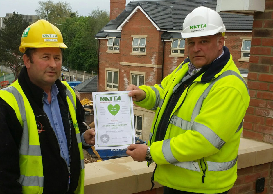 From left to right: Nick Lelaj being presented with his award for Expertise from Simon Homer