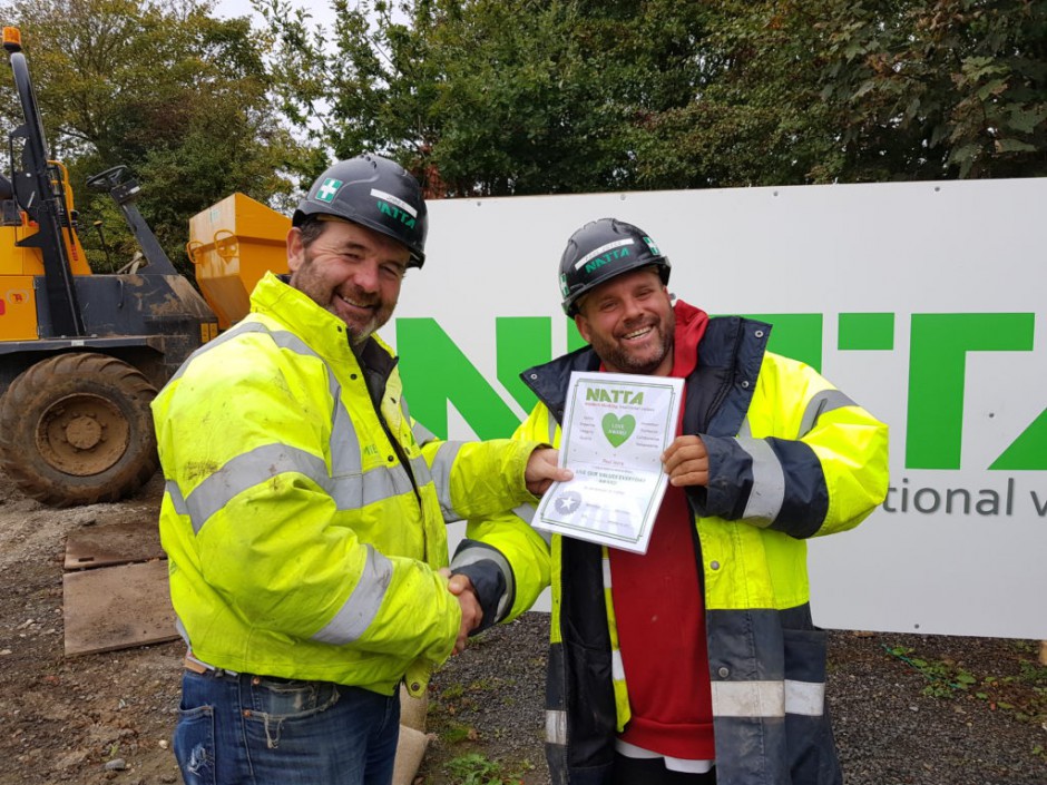 Right to left: Jamie Cracknell presenting Paul Joyce with his LOVE Award for Safety