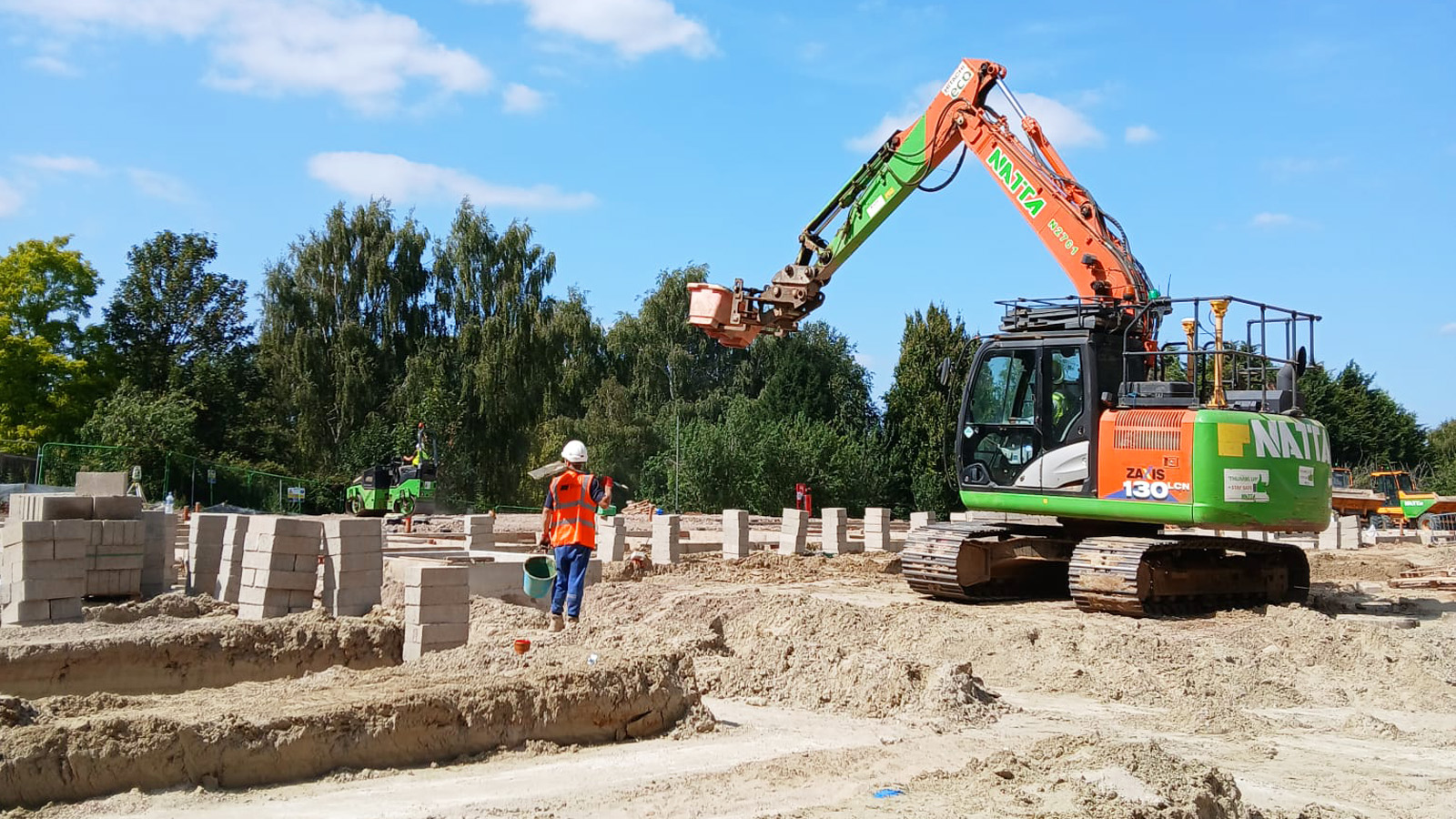 Block placement by excavator at our Sittingbourne project | Natta Sittingbourne Care Home Progress - Senior Living & Infrastructure